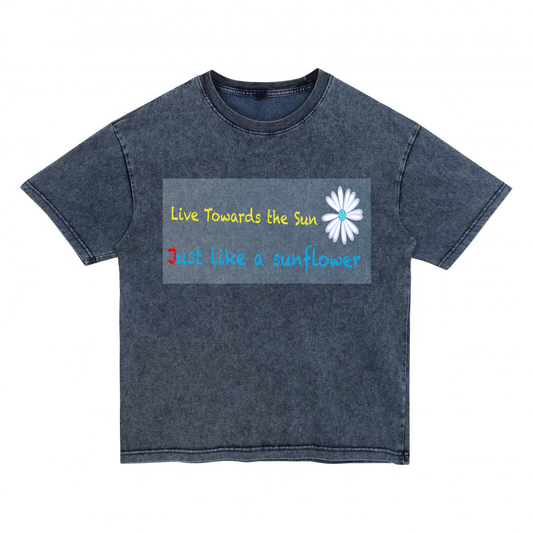 Front view of blue t恤 featuring Sunward Bloom Denim Washed Tee